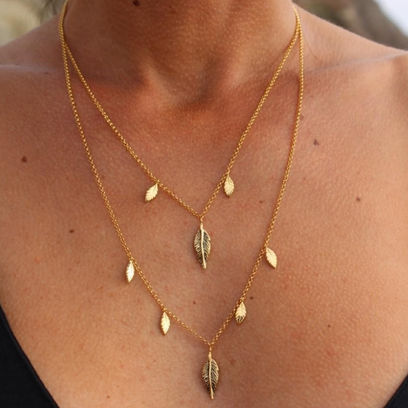 Collana doppia piume argento placcato oro giallo